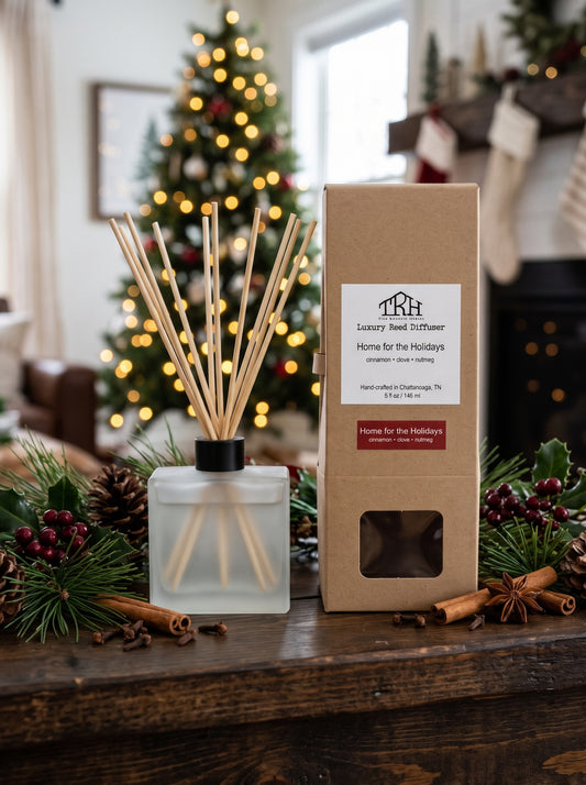 Home for the Holidays reed diffuser in a styled lifestyle setting