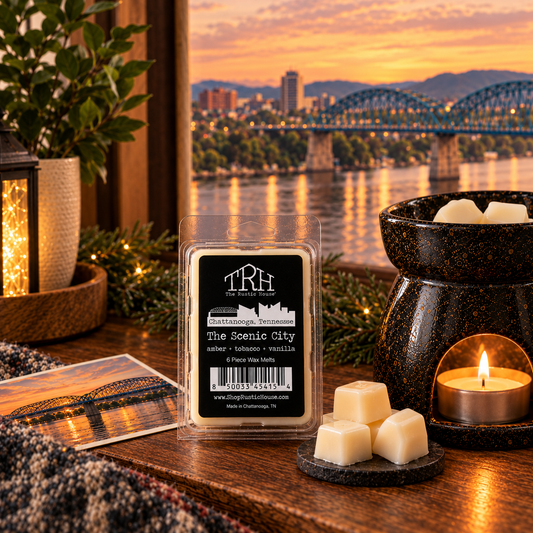 The Scenic City wax melt in a styled lifestyle setting