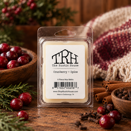 Cranberry + Spice wax melt in a styled lifestyle setting