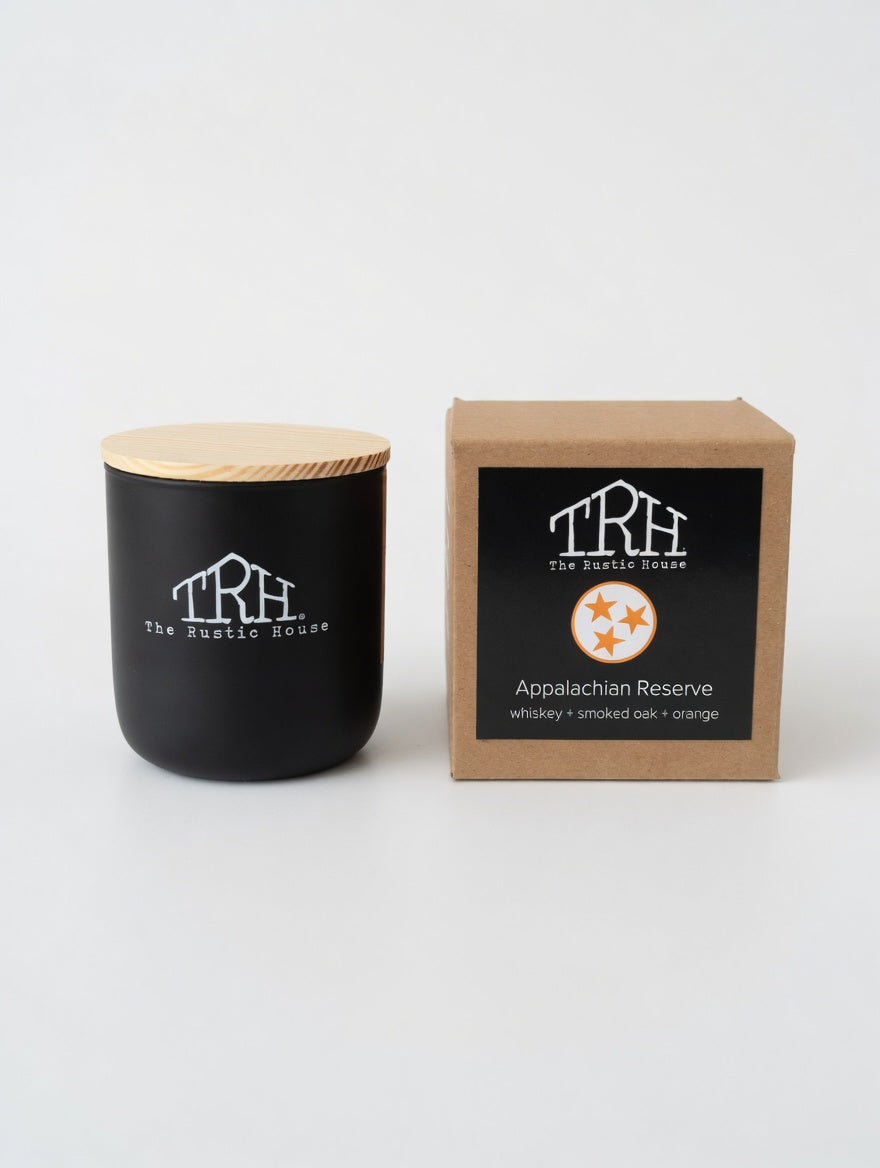 Appalachian Reserve black glass candle beside its gift box