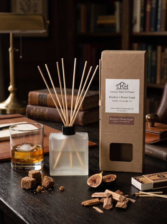 Bourbon + Brown Sugar reed diffuser in a styled lifestyle setting