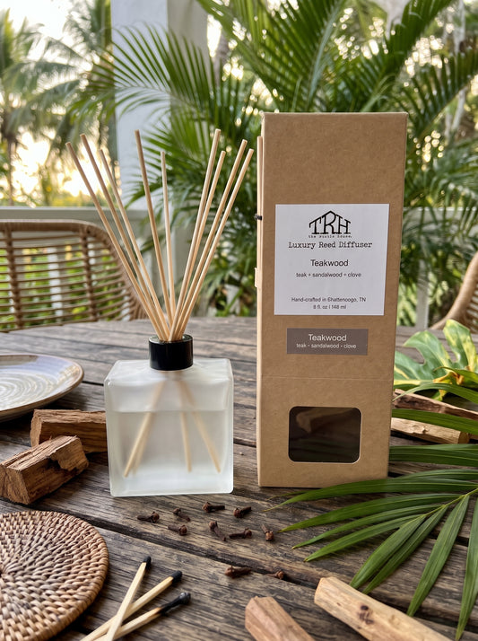 Teakwood reed diffuser in a styled lifestyle setting