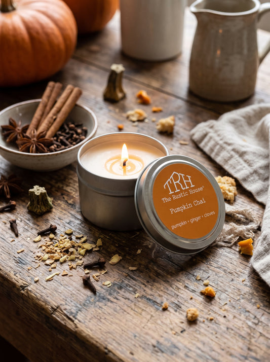 Pumpkin Chai travel tin in a styled lifestyle setting